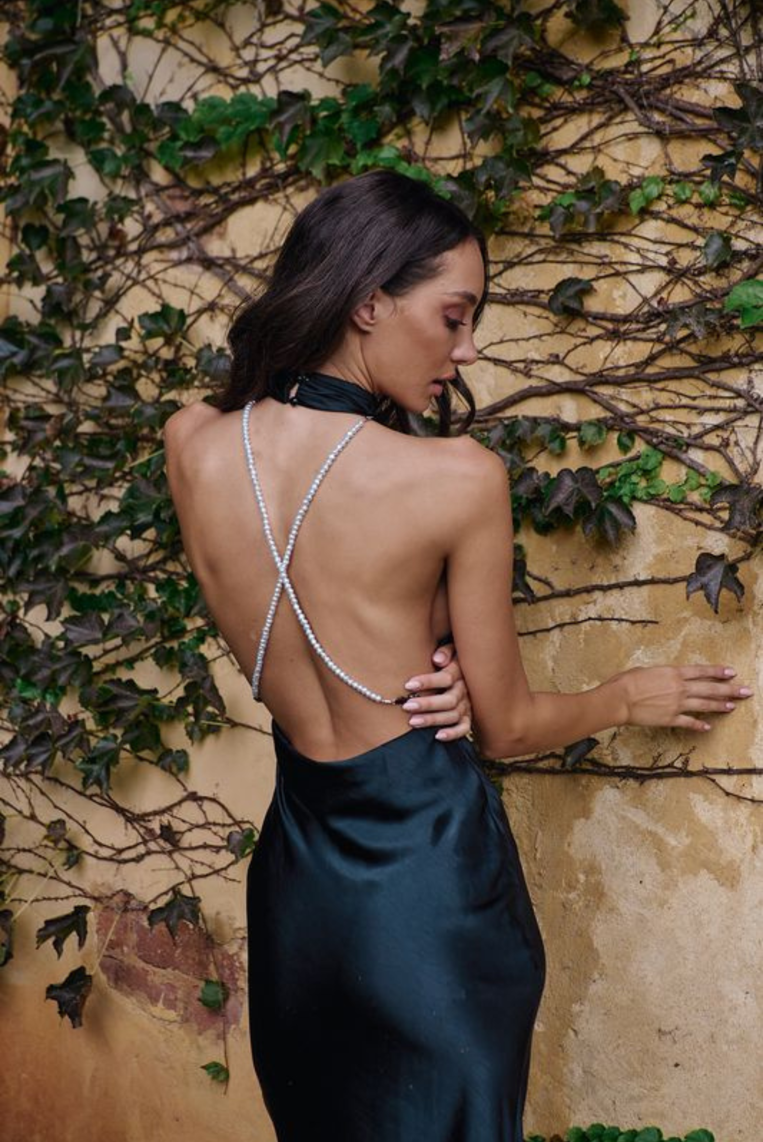 Consider the Backless Dress for a New Year's Eve at Home | Vogue
